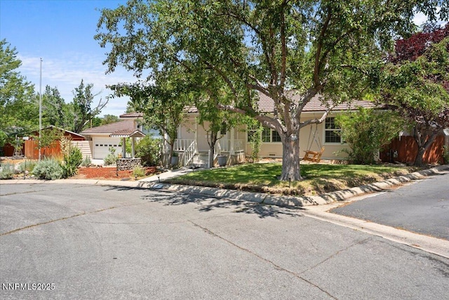 7 Circle Dr, Carson City, NV 89703 - obstructed view of property with a front yard and a tiled roof