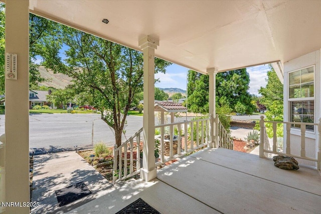 7 Circle Dr, Carson City, NV 89703 - covered porch featuring a mountain view