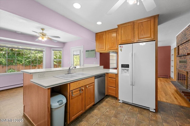 7 Circle Dr, Carson City, NV 89703 - kitchen featuring white refrigerator with ice dispenser, ceiling fan, dishwasher, a baseboard radiator, and recessed lighting