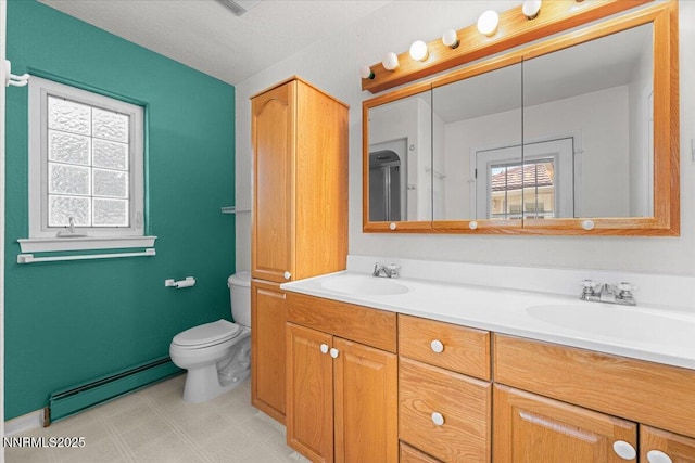 7 Circle Dr, Carson City, NV 89703 - full bath featuring a baseboard heating unit, double vanity, and tile patterned floors