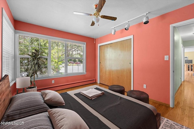 7 Circle Dr, Carson City, NV 89703 - living room with ceiling fan, track lighting, and light wood-style floors