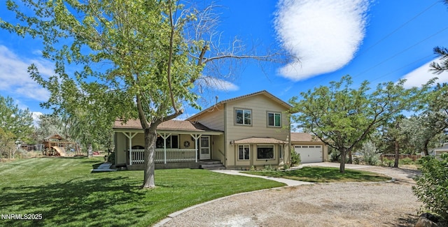 2450 Chukar Dr, Washoe Valley, NV 89704 - split level home featuring driveway, a porch, a garage, and a front yard
