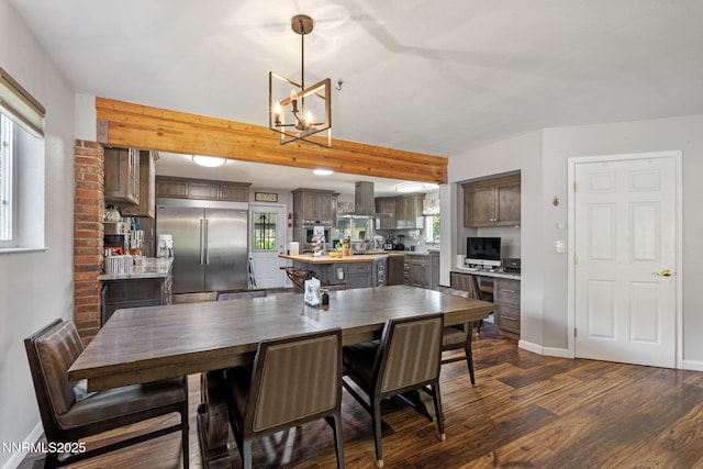 2450 Chukar Dr, Washoe Valley, NV 89704 - dining space with dark wood finished floors, healthy amount of natural light, a chandelier, and beam ceiling