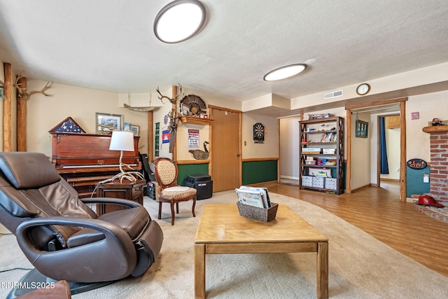 2450 Chukar Dr, Washoe Valley, NV 89704 - living room with a textured ceiling and wood finished floors