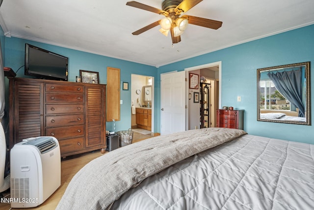 2450 Chukar Dr, Washoe Valley, NV 89704 - bedroom with ornamental molding, light wood finished floors, a ceiling fan, and ensuite bathroom