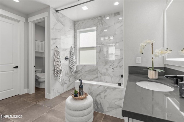 5517 Western Rider Trl, Reno, NV 89511 - bathroom with a marble finish shower, vanity, and recessed lighting