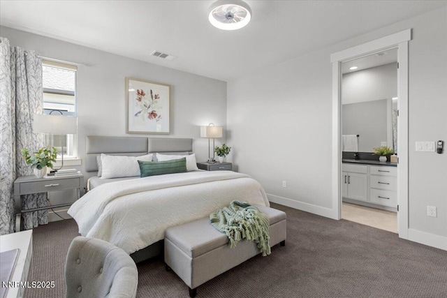 5517 Western Rider Trl, Reno, NV 89511 - bedroom featuring light colored carpet and ensuite bath