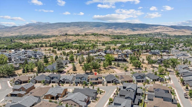 5517 Western Rider Trl, Reno, NV 89511 - aerial view of property and surrounding area with a mountainous background and nearby suburban area
