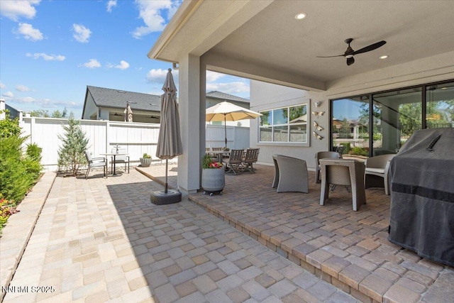 5517 Western Rider Trl, Reno, NV 89511 - view of patio / terrace featuring grilling area, outdoor dining area, and a ceiling fan
