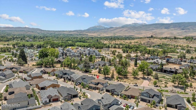 5517 Western Rider Trl, Reno, NV 89511 - aerial perspective of suburban area with a mountainous background