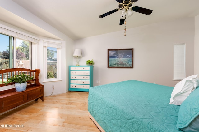 653 Carmel Way, Gardnerville, NV 89460 - bedroom with light wood-style floors, vaulted ceiling, and a ceiling fan