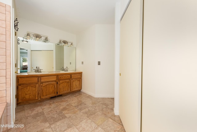 653 Carmel Way, Gardnerville, NV 89460 - full bathroom with double vanity and stone finish floors