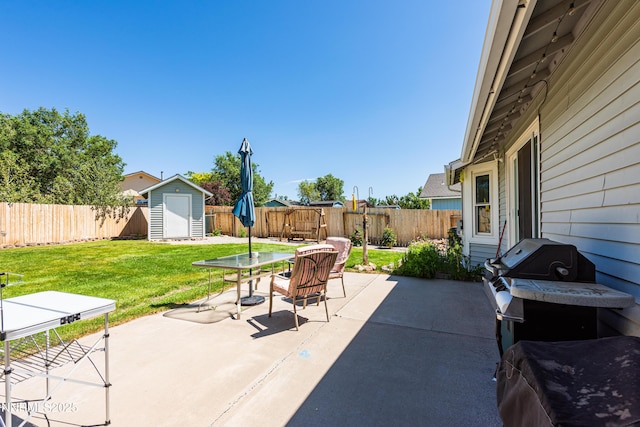 653 Carmel Way, Gardnerville, NV 89460 - fenced backyard with a storage shed, a patio area, and a grill