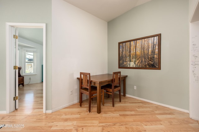 653 Carmel Way, Gardnerville, NV 89460 - dining space with lofted ceiling and light wood-style flooring