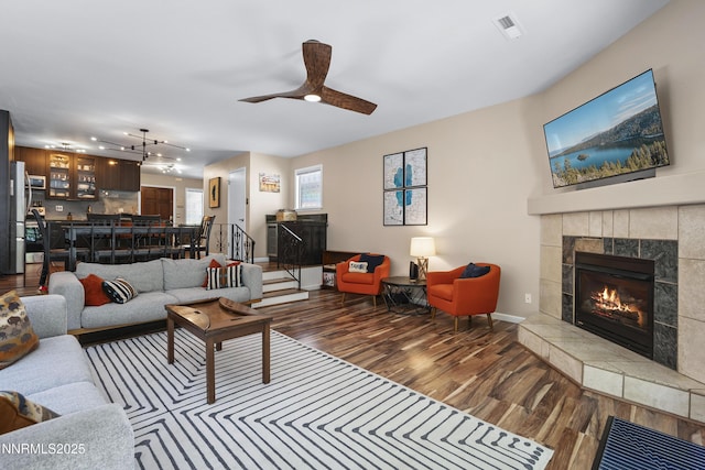 978 Glenrock Dr Unit 36, Incline Village, NV 89451 - living area with wood finished floors, a tile fireplace, a ceiling fan, and track lighting