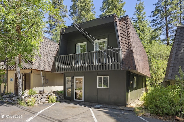 978 Glenrock Dr Unit 36, Incline Village, NV 89451 - a-frame home with a balcony, uncovered parking, and a shingled roof