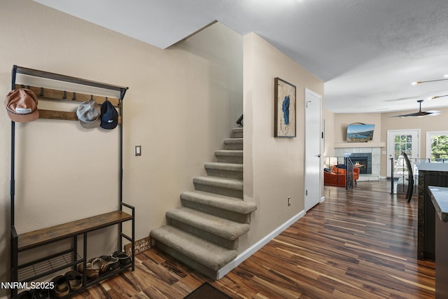 978 Glenrock Dr Unit 36, Incline Village, NV 89451 - staircase with wood finished floors, a fireplace, and a ceiling fan