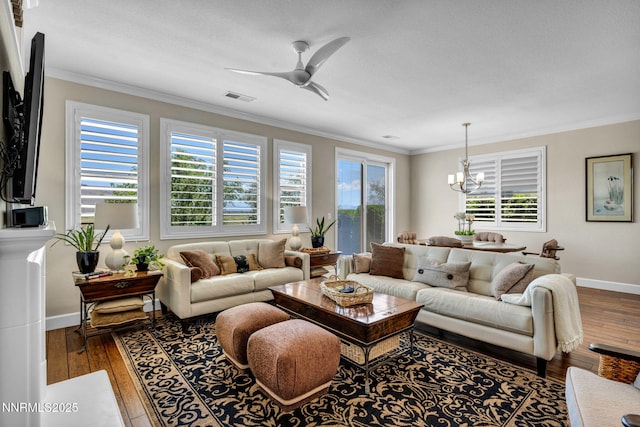 3579 Long Dr, Minden, NV 89423 - living room with crown molding, a chandelier, wood-type flooring, and a ceiling fan