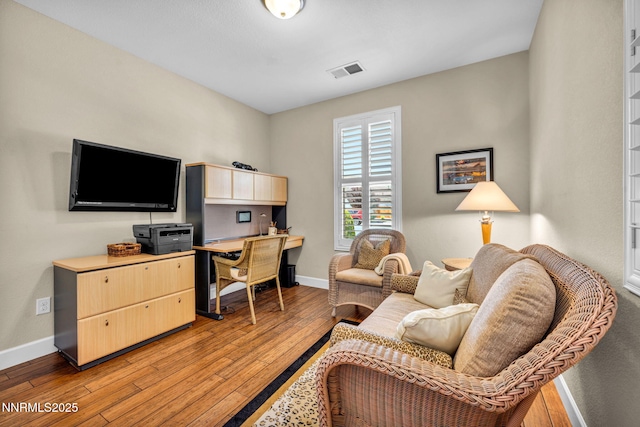 3579 Long Dr, Minden, NV 89423 - home office featuring built in desk and light wood-type flooring