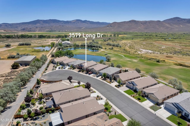 3579 Long Dr, Minden, NV 89423 - aerial view of residential area featuring a water and mountain view and a local golf course