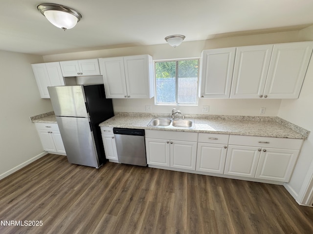 1568 County Rd, Minden, NV 89423 - kitchen with appliances with stainless steel finishes, dark wood-type flooring, and white cabinetry