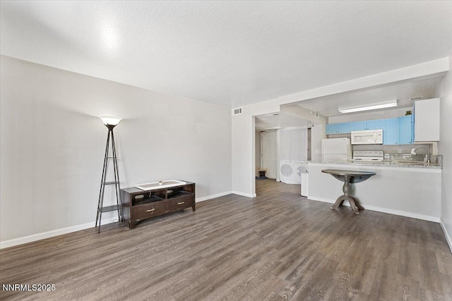 2555 Clear Acre Ln Apt 13, Reno, NV 89512 - living area featuring wood finished floors and baseboards