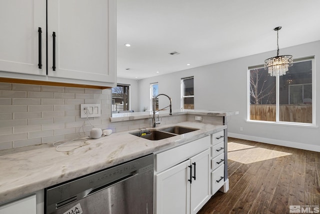 1585 Foster Dr, Reno, NV 89509 - kitchen featuring stainless steel dishwasher, backsplash, dark wood-type flooring, white cabinetry, and recessed lighting