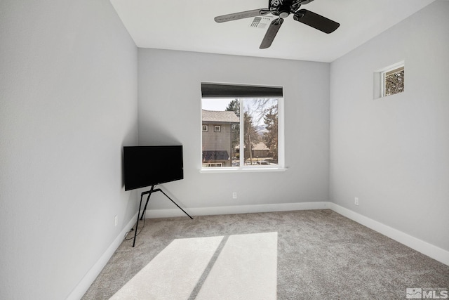 1585 Foster Dr, Reno, NV 89509 - unfurnished bedroom featuring carpet, multiple windows, and ceiling fan