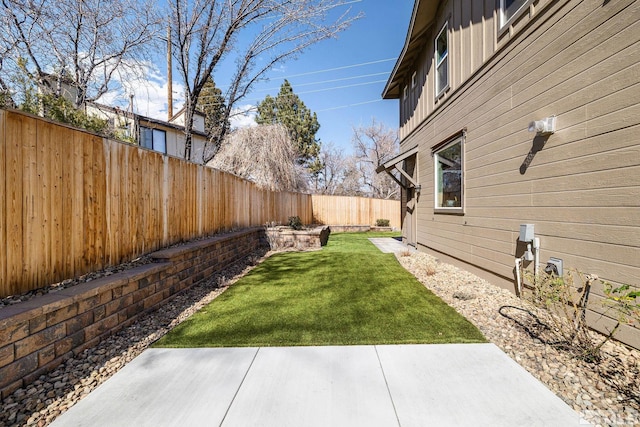 1585 Foster Dr, Reno, NV 89509 - fenced backyard featuring a patio area