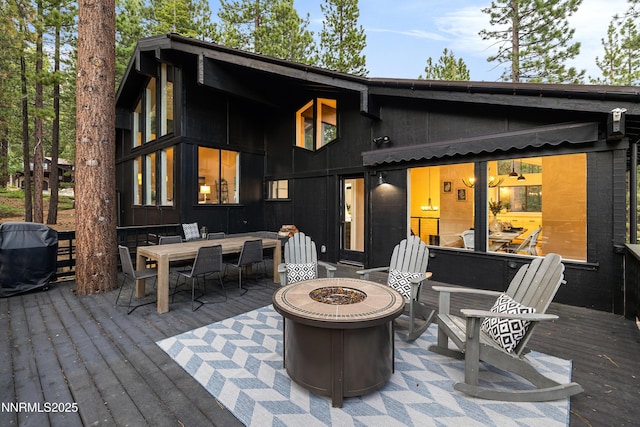 960 Apollo Way, Incline Village, NV 89451 - wooden terrace featuring an outdoor fire pit, outdoor dining area, and grilling area