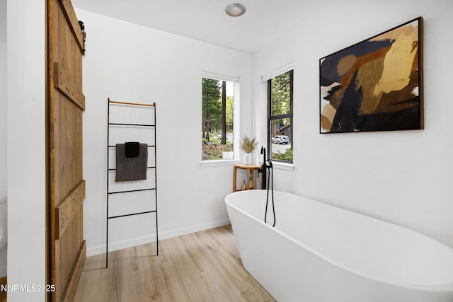 960 Apollo Way, Incline Village, NV 89451 - bathroom with wood finished floors and a soaking tub
