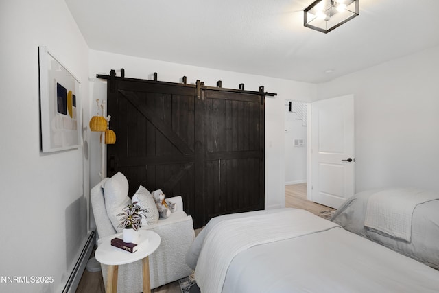 960 Apollo Way, Incline Village, NV 89451 - bedroom with wood finished floors and a barn door