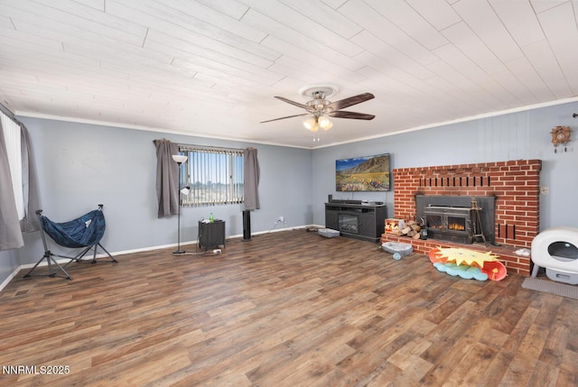 3480 York Ln, Fallon, NV 89406 - living area with a fireplace, wood finished floors, crown molding, and a ceiling fan