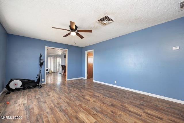 3480 York Ln, Fallon, NV 89406 - spare room featuring ceiling fan, wood finished floors, and a textured ceiling