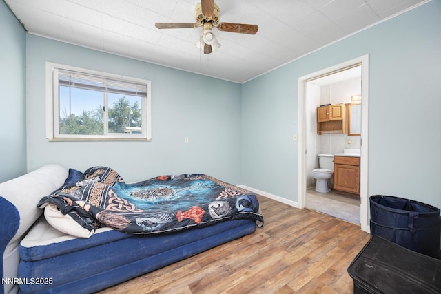3480 York Ln, Fallon, NV 89406 - bedroom with wood finished floors, ensuite bathroom, ornamental molding, and ceiling fan