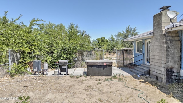 3480 York Ln, Fallon, NV 89406 - view of yard featuring entry steps, a patio, and a hot tub