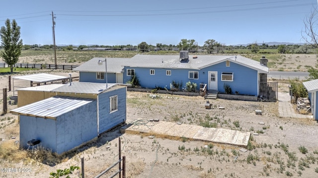 3480 York Ln, Fallon, NV 89406 - back of property with a chimney
