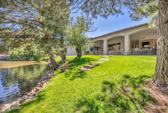 3820 Frost Ln, Reno, NV 89511 - view of grassy yard with a water view