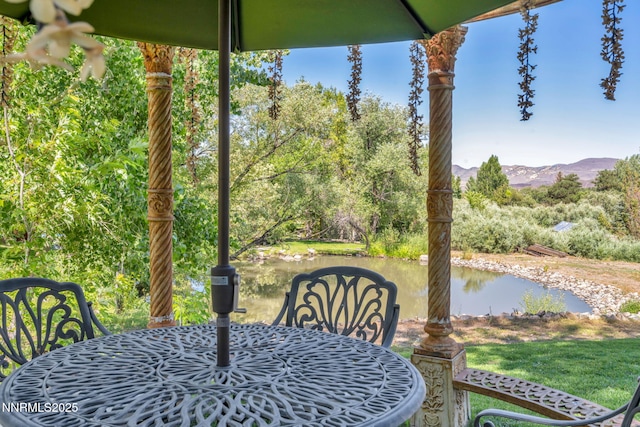 3820 Frost Ln, Reno, NV 89511 - view of patio / terrace featuring a mountain view and outdoor dining space