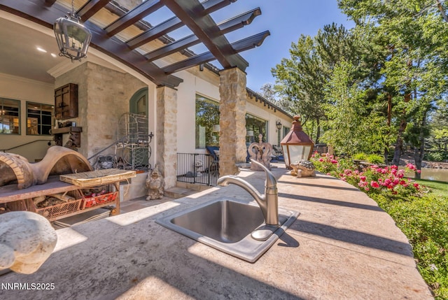 3820 Frost Ln, Reno, NV 89511 - view of patio / terrace with a sink and a pergola
