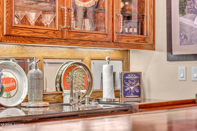 3820 Frost Ln, Reno, NV 89511 - detailed view of a community bar and glass insert cabinets