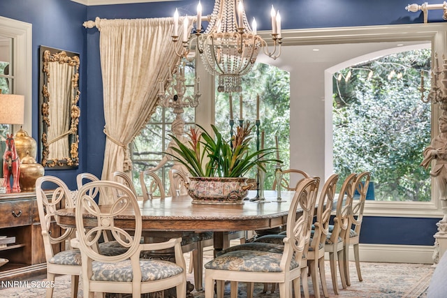 3820 Frost Ln, Reno, NV 89511 - dining space featuring a chandelier and baseboards