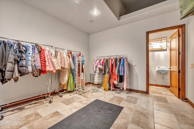 3820 Frost Ln, Reno, NV 89511 - walk in closet featuring stone tile floors