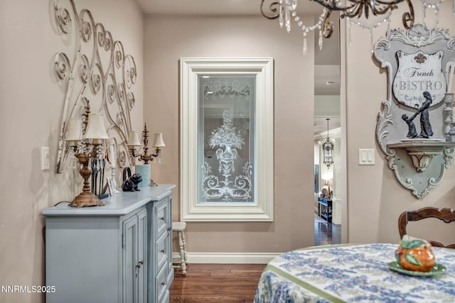 3820 Frost Ln, Reno, NV 89511 - bedroom with dark wood finished floors and a chandelier