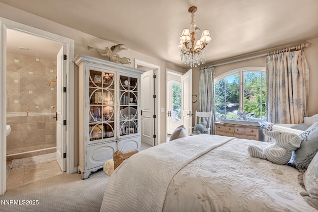 3820 Frost Ln, Reno, NV 89511 - tiled bedroom with a chandelier, connected bathroom, and access to exterior