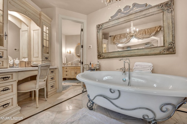 3820 Frost Ln, Reno, NV 89511 - bathroom featuring marble finish floors, a chandelier, a soaking tub, and vanity