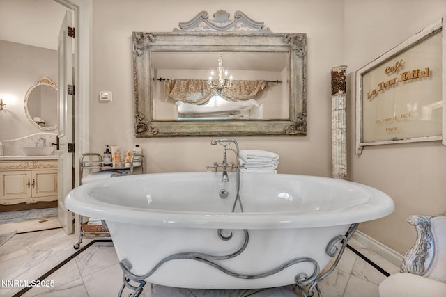 3820 Frost Ln, Reno, NV 89511 - full bath with marble finish floors, a soaking tub, and a chandelier