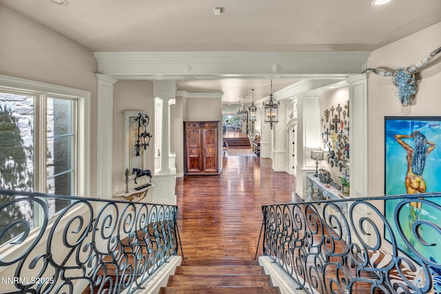 3820 Frost Ln, Reno, NV 89511 - corridor featuring ornate columns, dark wood-type flooring, stairway, and recessed lighting