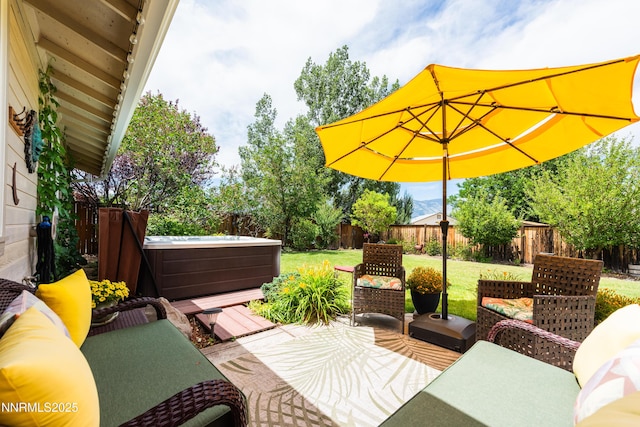 644 Carmel Way, Gardnerville, NV 89460 - fenced backyard featuring a hot tub, an outdoor living space, and a patio