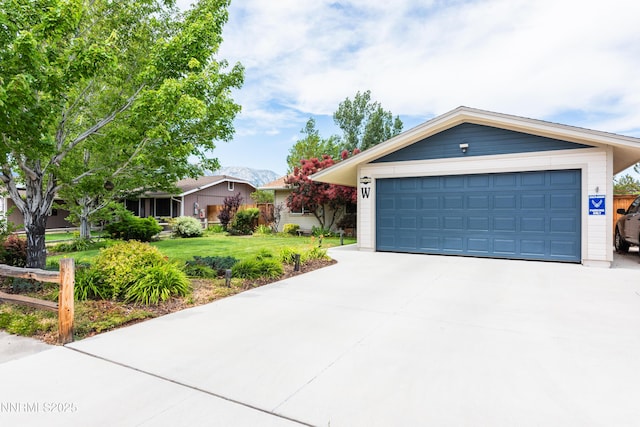 644 Carmel Way, Gardnerville, NV 89460 - ranch-style home featuring a garage